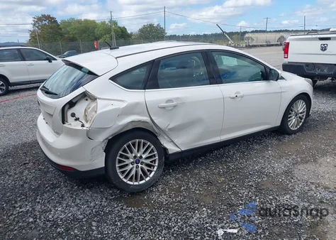 2014 Ford Focus Titanium из США, поврежденный, VIN 1FADP3N25EL396091